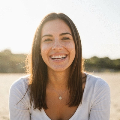 Person smiling after successful Invisalign treatment